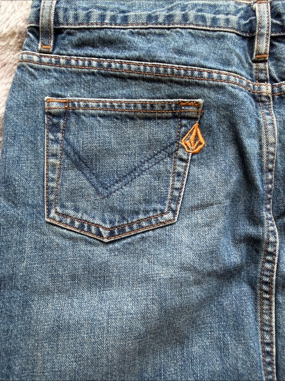 Volcom Denim Jeans in Faded Blue with Gold Stitching Accent 
90’s